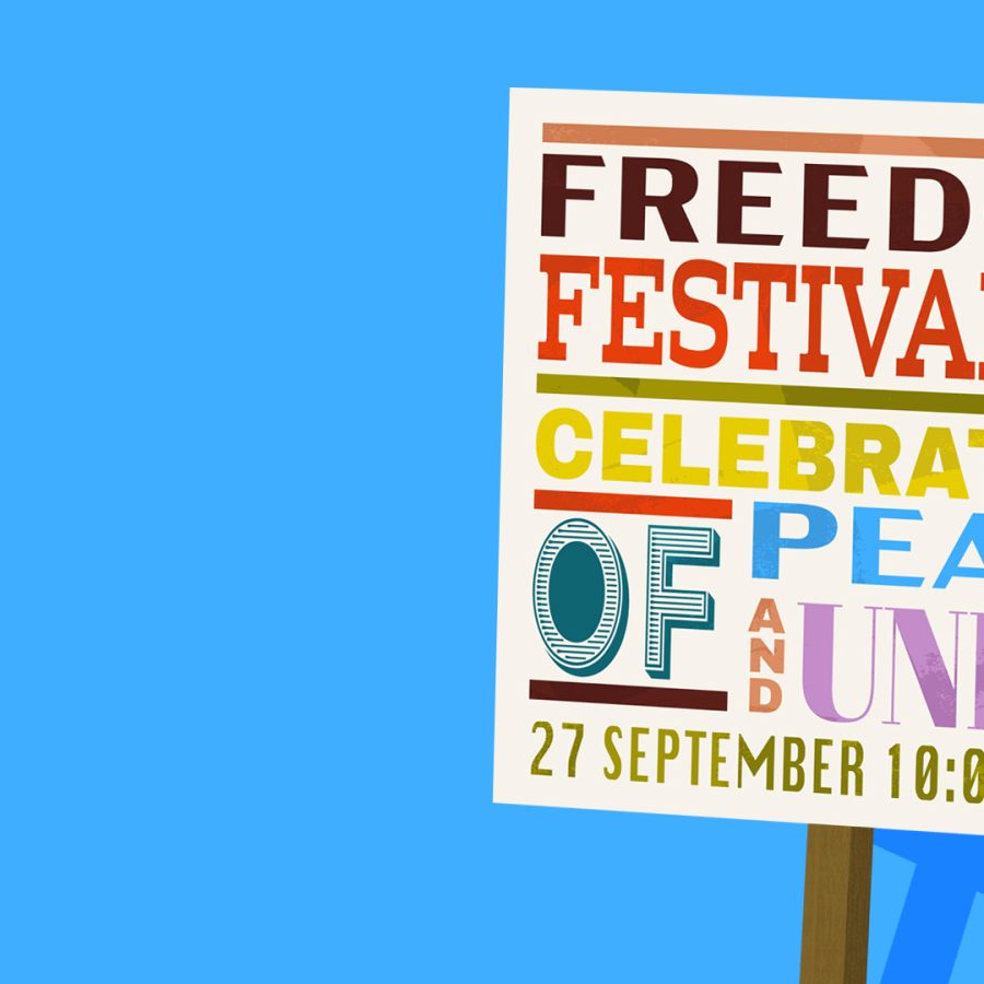 Illustrated poster on a blue background reading: ‘FREEDOM FESTIVAL – CELEBRATION OF PEACE AND UNITY – 27 September 10:00–16:00.’ The words are displayed in bold