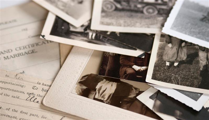 stack of b/w photographs