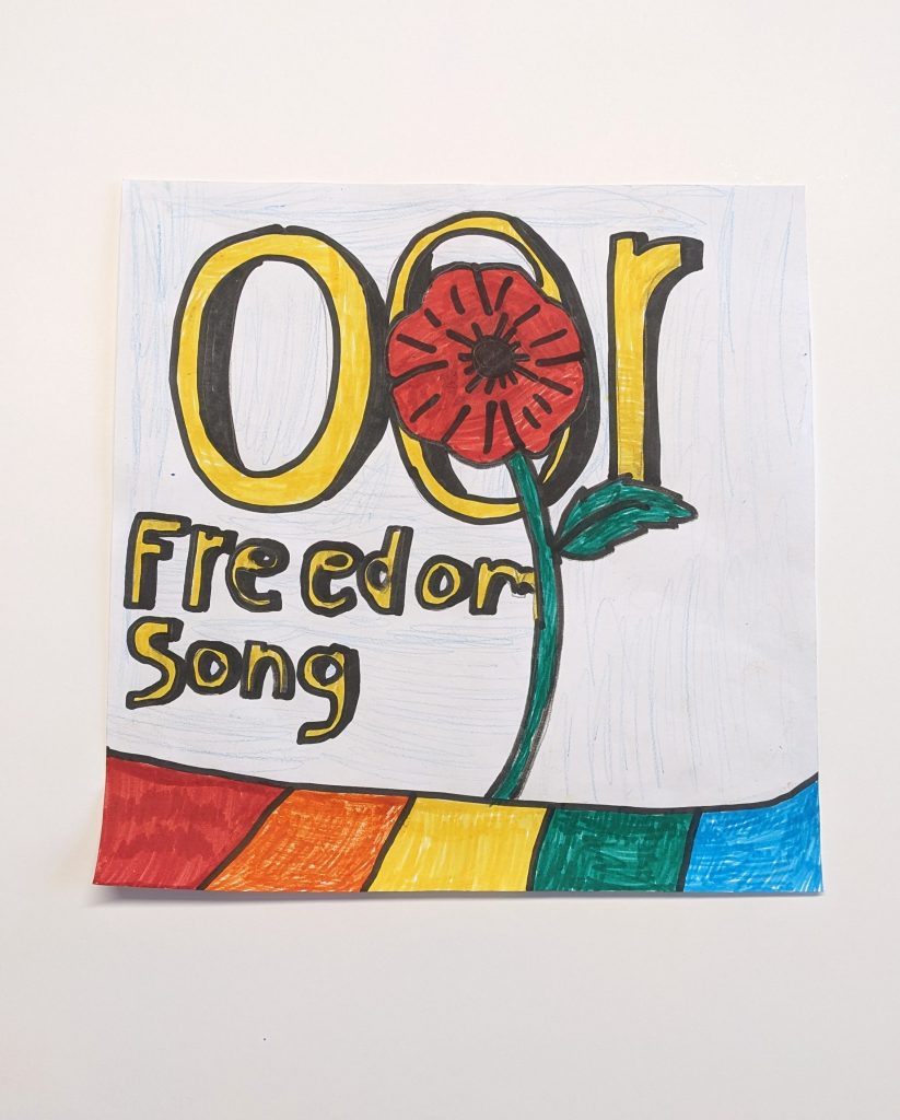 Oor Freedom Song Poster Image, showing a poppy over the words 'Oor Freedom Song'